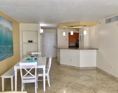 6917 Collins Ave - Photo Thumbnail 8