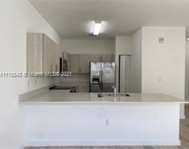 15540 Sw 136th St Unit 105 - Photo Thumbnail 1