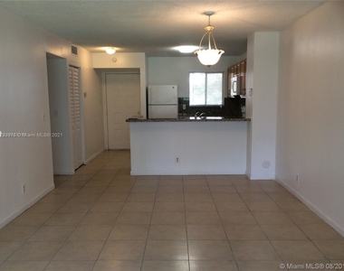 8750 N Sherman Cir - Photo Thumbnail 4