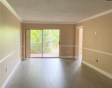 9731 Fontainebleau Blvd - Photo Thumbnail 1