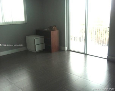 6969 Collins Ave - Photo Thumbnail 10