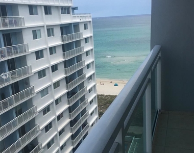 6917 Collins Ave - Photo Thumbnail 1