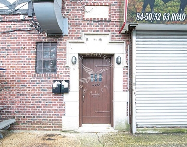 6328 Woodhaven Blvd - Photo Thumbnail 11