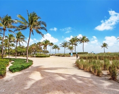 9920 Collins Ave - Photo Thumbnail 1