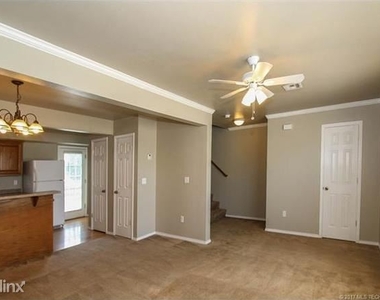 6701 S Utica Place - Photo Thumbnail 1