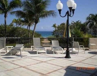 10185 Collins Ave - Photo Thumbnail 10