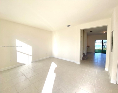 11275 W 34th Way - Photo Thumbnail 1