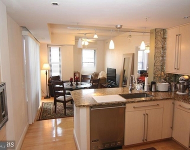 7710 Woodmont Ave #401 - Photo Thumbnail 7