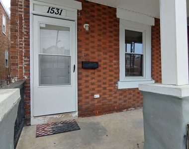 1531 N Robinson St - Photo Thumbnail 1