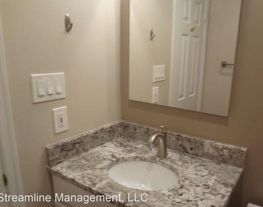 5715 Brewer House Circle Unit #101 - Photo Thumbnail 10