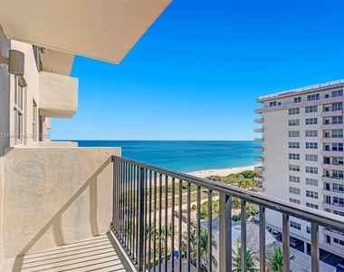 9273 Collins Ave - Photo Thumbnail 12