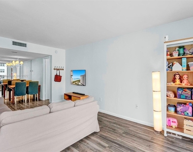 9273 Collins Ave - Photo Thumbnail 2