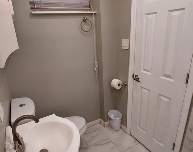 9308 Cedar Lane - Photo Thumbnail 11