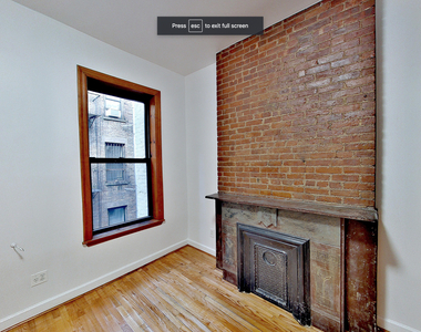 306 East 11 Street - Photo Thumbnail 0