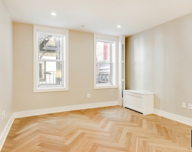 220 West 24 Street - Photo Thumbnail 1