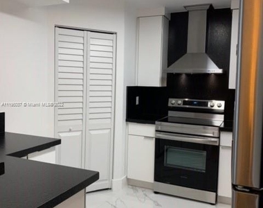 9273 Collins Ave - Photo Thumbnail 4