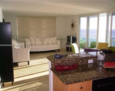 6917 Collins Ave - Photo Thumbnail 2