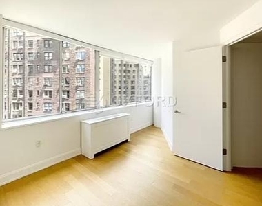 E 54th St. - Photo Thumbnail 2