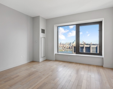 Modern Spacious Studio on Wall St - Photo Thumbnail 1