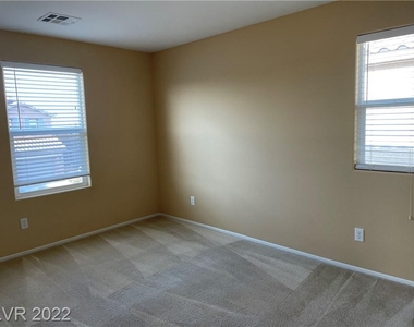 8620 Rowland Bluff Avenue - Photo Thumbnail 21