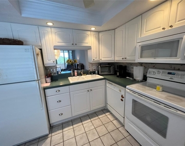 2621 Cove Cay Drive - Photo Thumbnail 2