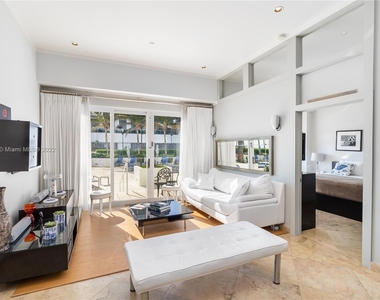 6917 Collins Ave - Photo Thumbnail 1