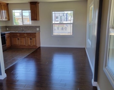 8706 Parthenia Pl - Photo Thumbnail 3