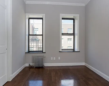 338 East 100th Street - Photo Thumbnail 6