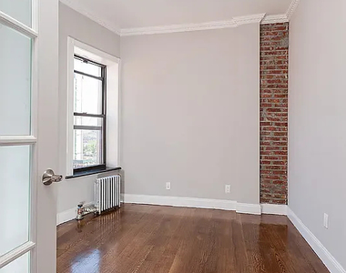338 East 100th Street - Photo Thumbnail 4