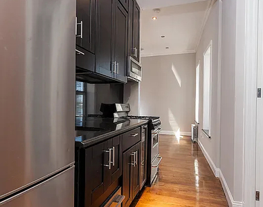 338 East 100th Street - Photo Thumbnail 3