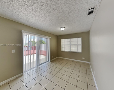 9880 Nw 5th Ct - Photo Thumbnail 2