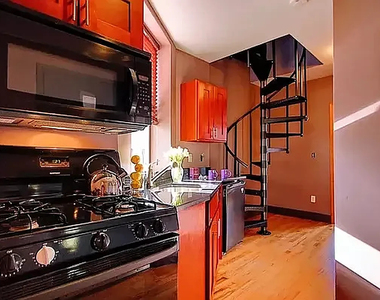 110 East 7th Street - Photo Thumbnail 2