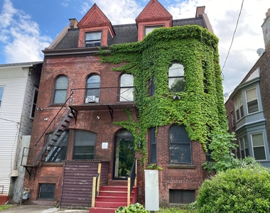 142 Morton Ave - Photo Thumbnail 1