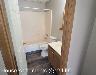 220 E 12th St - Photo Thumbnail 8