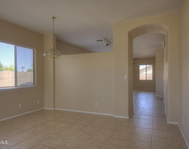 8776 W Adam Avenue - Photo Thumbnail 2