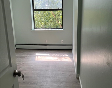84-10 101st Street - Photo Thumbnail 12