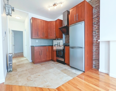 433 West 46 Street - Photo Thumbnail 1