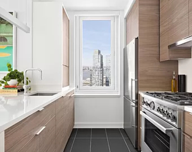 555 w 38th street - Photo Thumbnail 1