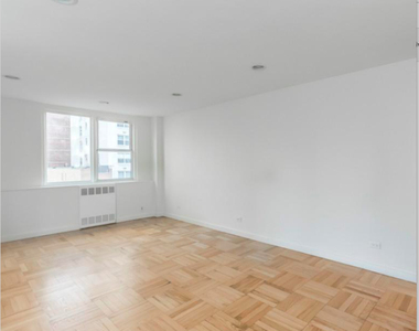 East 77 ST - Photo Thumbnail 3