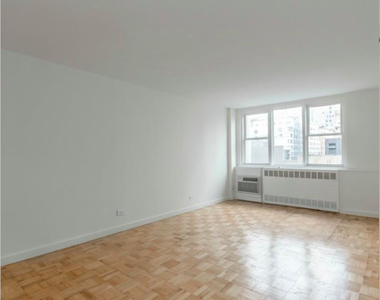 East 77 ST - Photo Thumbnail 2