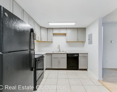 7305-7315 West 9th Place - Photo Thumbnail 1