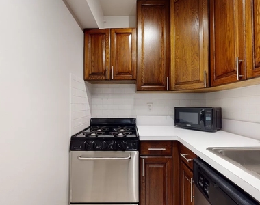 305 W 13th St - Photo Thumbnail 4