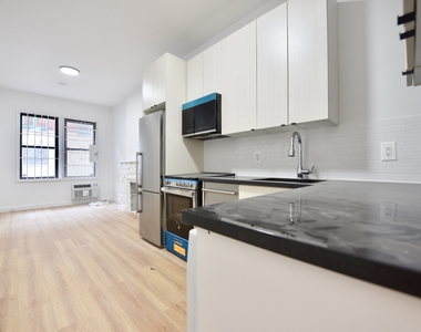 446 West 55th Street - Photo Thumbnail 1