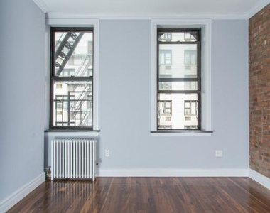 214 East 25th Street - Photo Thumbnail 1