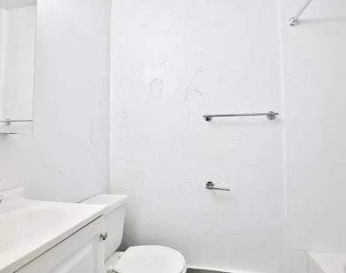 311 East 25th Street - Photo Thumbnail 5