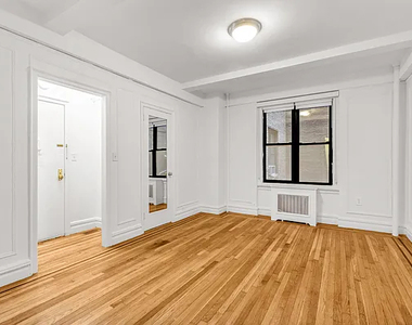 208 West 23rd Street - Photo Thumbnail 1