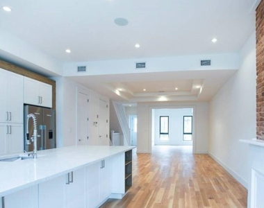 1128 Halsey St - Photo Thumbnail 2