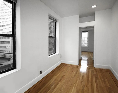 234 East 58th Street - Photo Thumbnail 3