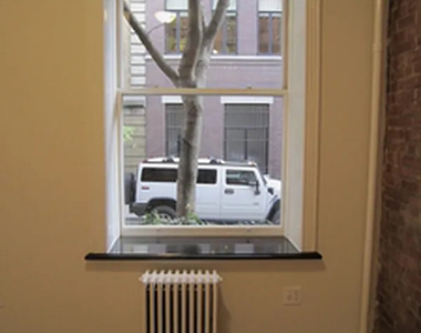 343 East 5th Street - Photo Thumbnail 3