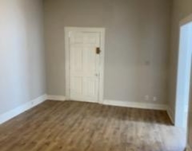 1138 W Ashby Pl - Photo Thumbnail 2